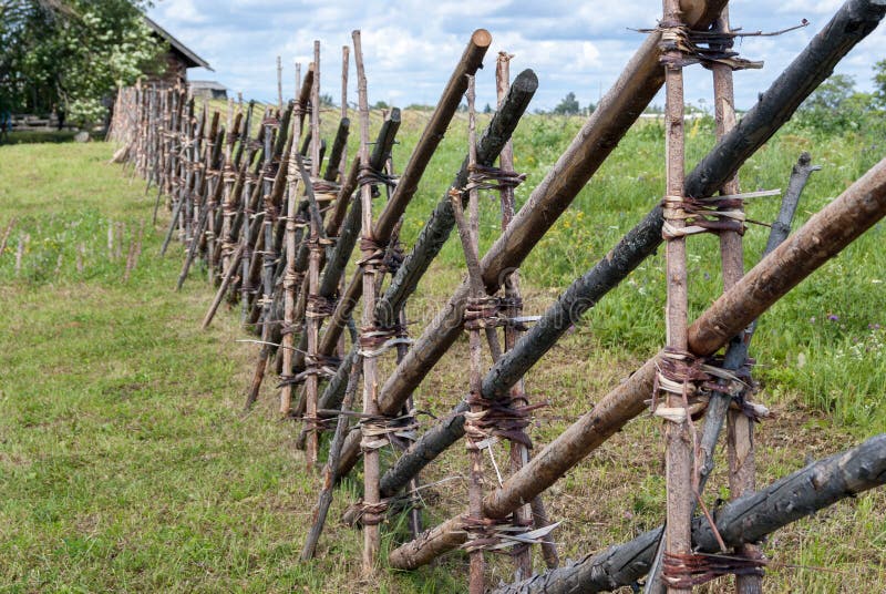 vintage old wooden fence out of sticks