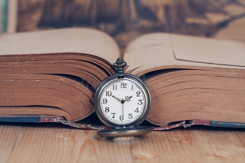 Vintage Pocket Watch on Books. Stock Photo Image of deadline, minute