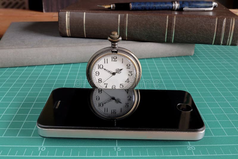 Vintage Pocket Watch with Cell Phone and a Business Tool . Stock Image