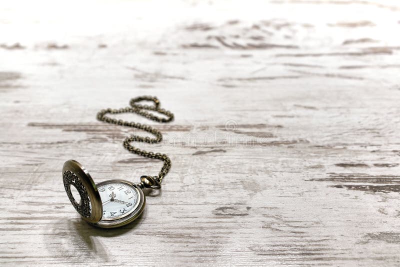 Vintage Pocket Watch on Old Aged Wood Background royalty free stock images Vintage Pocket Watch on Old Aged Wood Background royalty free stock images