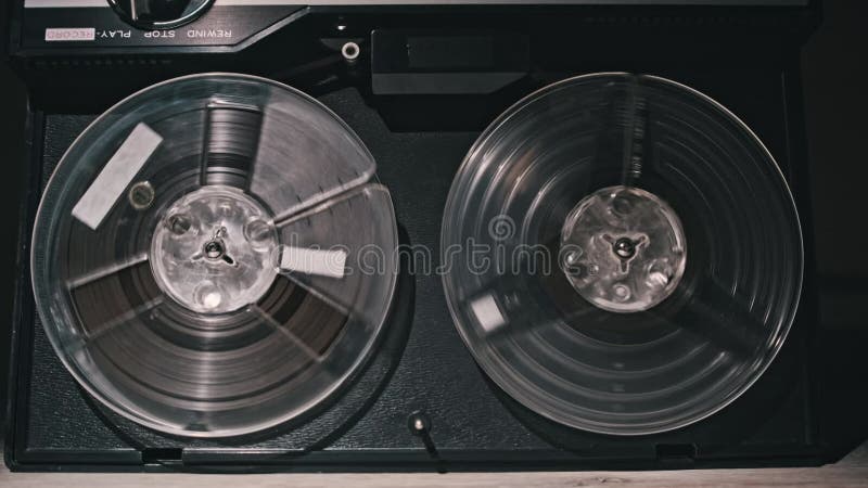 Vintage reel to reel tape player playing audio stock footage