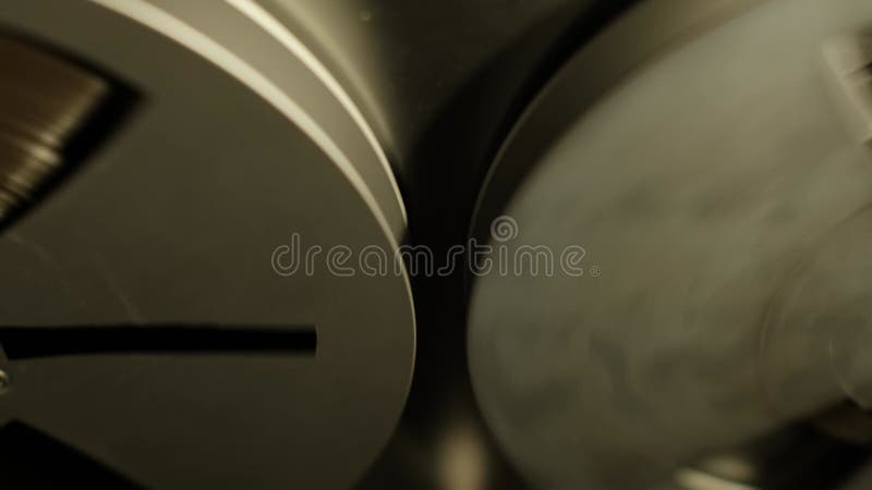 Vintage Reel to Reel Tape Moving in Audio Playback stock footage