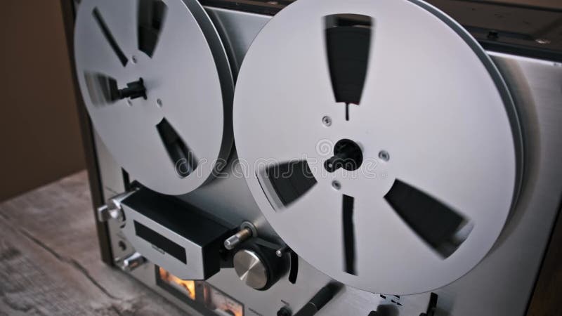 Vintage reel-to-reel tape recorder in motion stock video