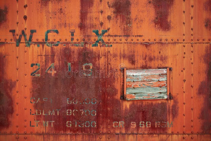 Sólido pero viejo naranja oxidado antiguo acero vias ferreas cabina auto página viejo pintado calificación gráficos.