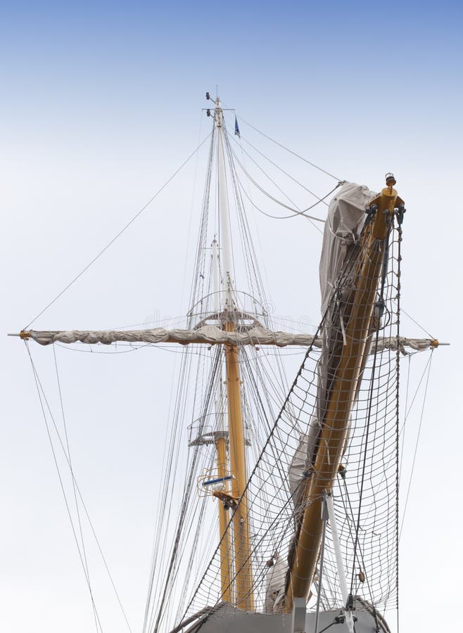Vintage sailing ship mast and sails royalty free stock image
