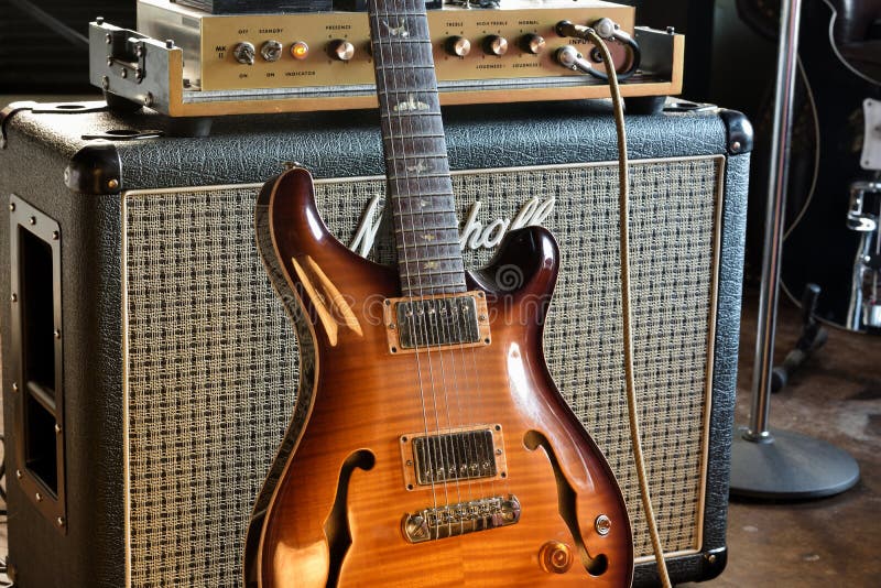 Vintage Semi Hollowbody Electric Guitar with Tube Amp Stock Photo