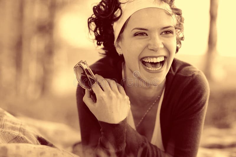 Vintage sepia portrait of a girl in summer forest