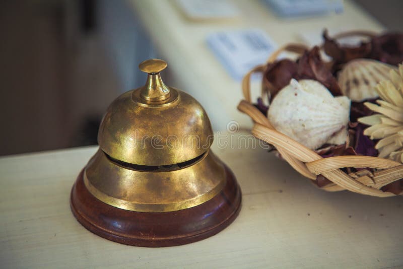 Vintage service bell on reception desk in hotel, close-up stock image Vintage service bell on reception desk in hotel, close-up stock image
