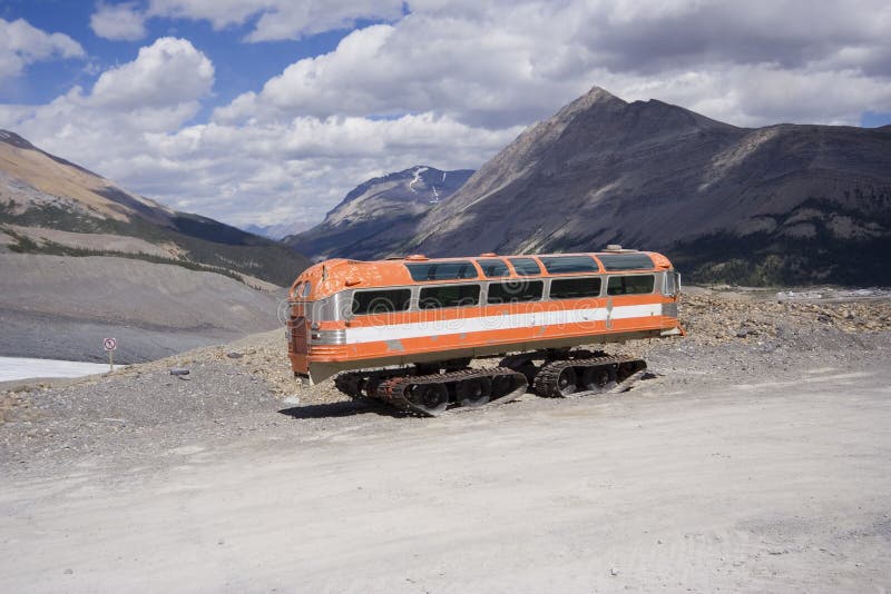 Vintage snowmobile in the rocky mountains - columbia icefield, jasper national park, canada - adobe RGB