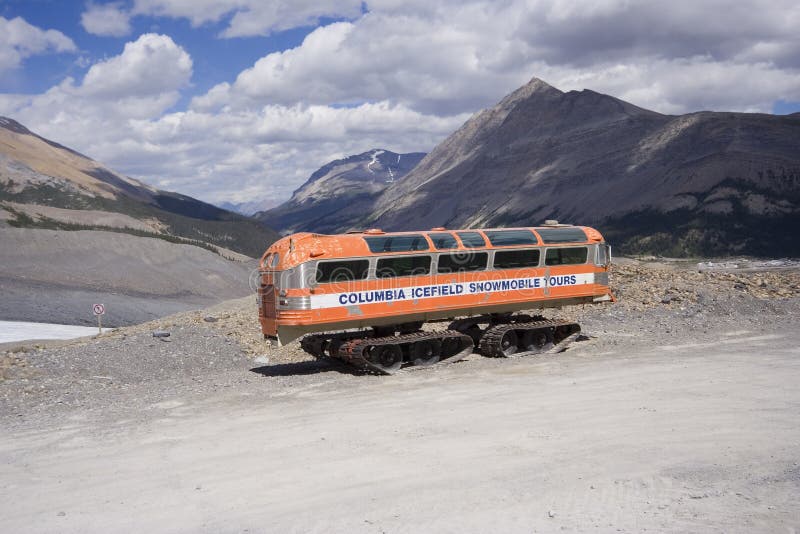 Vintage snowmobile in the rocky mountains - columbia icefield, jasper national park, canada - adobe RGB