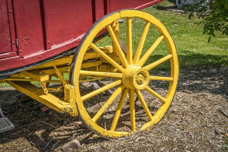 Vintage stagecoach wheel stock photo. Image of yellow 93762652