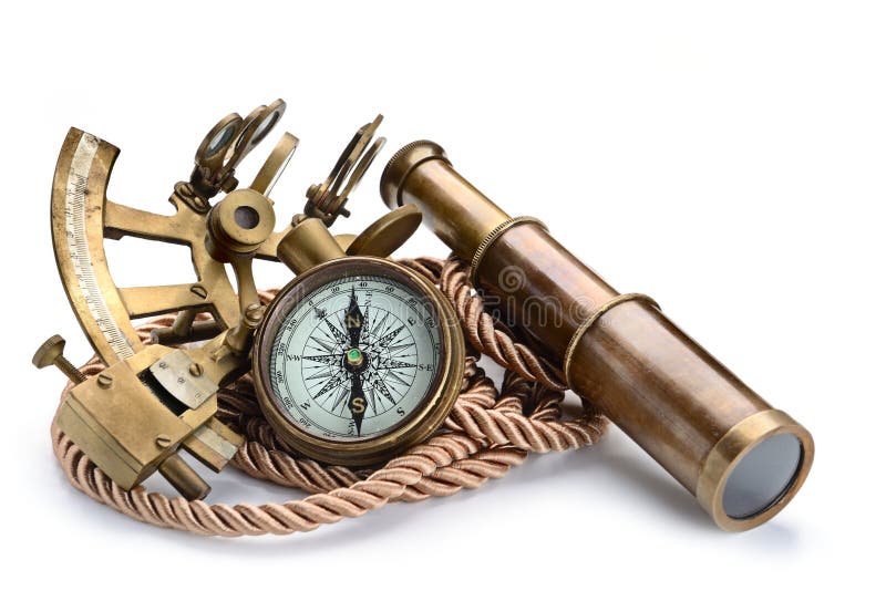 Vintage still life with compass,sextant and spyglass on white background