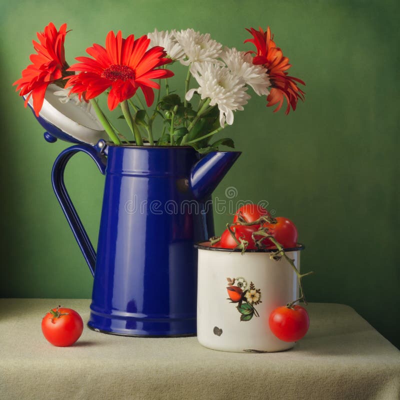 Vintage still life with flowers and cherry tomatoes
