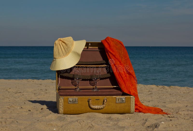 Vintage suitcase on beach