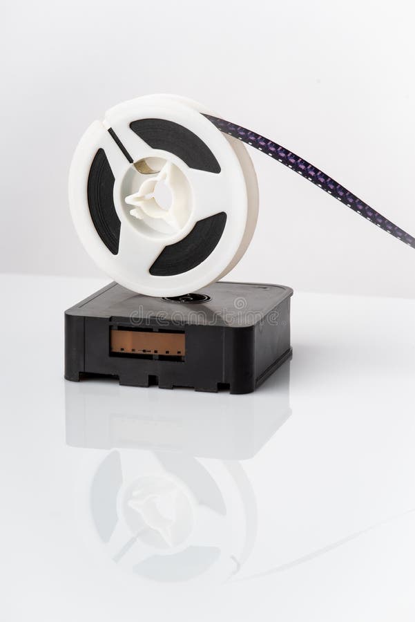 Super 8mm Film in cartridge and on a reel. royalty free stock photo Super 8mm Film in cartridge and on a reel. royalty free stock photo
