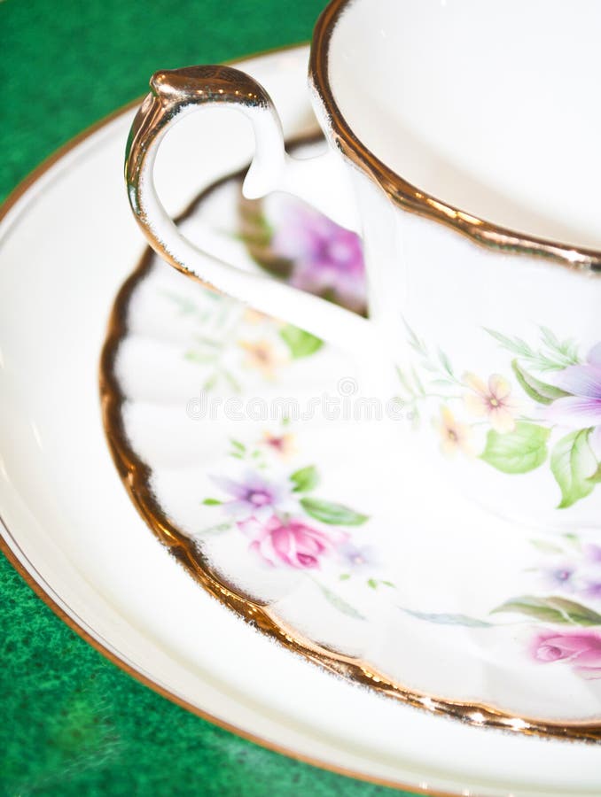 Vintage tea or coffee cup with floral pattern