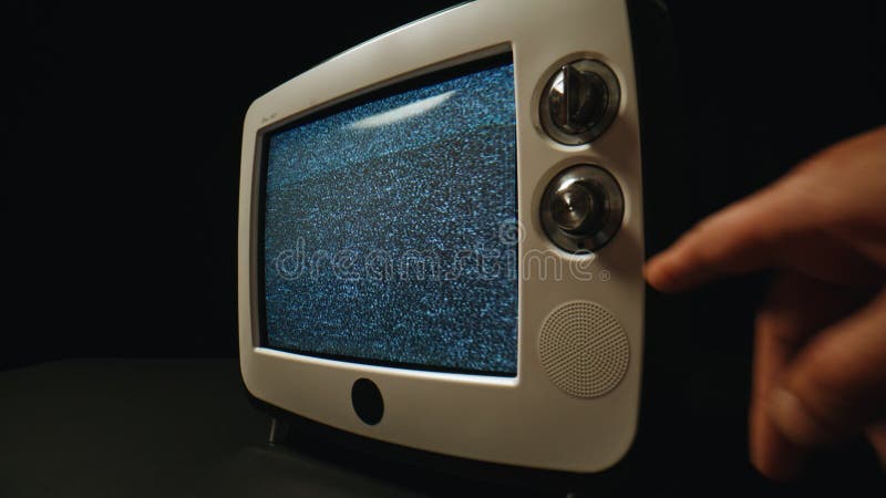 Vintage television screen flickering with analog static noise pattern closeup. stock video