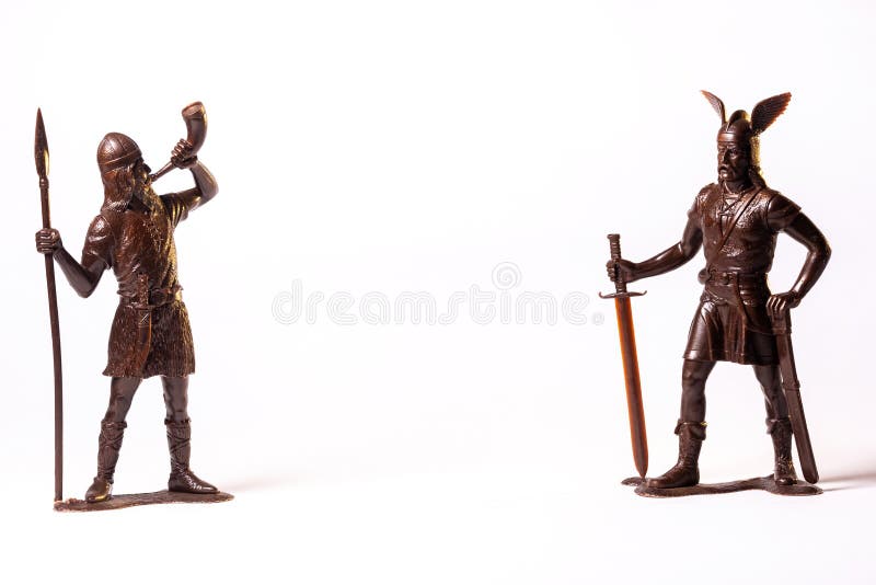 Vintage toy Brown Viking soldiers isolated on white background.