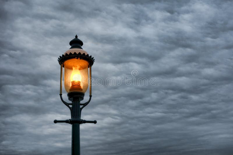 Vintage Victorian Style Streetlight and Stormy Sky