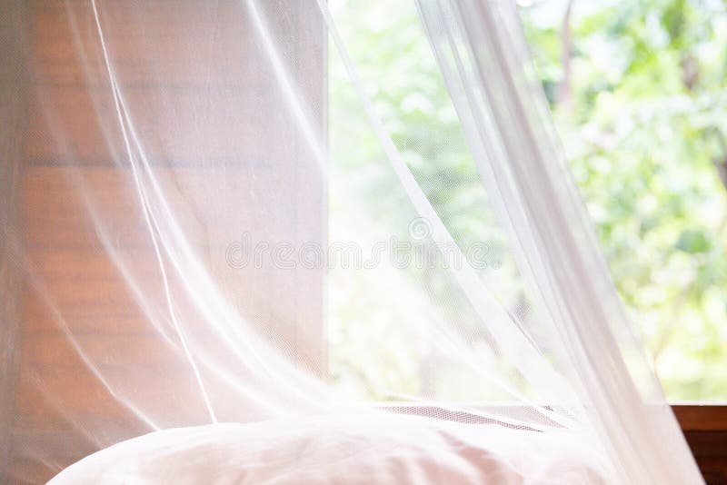 Vintage white mosquito curtain in a hut or house royalty free stock image Vintage white mosquito curtain in a hut or house royalty free stock image