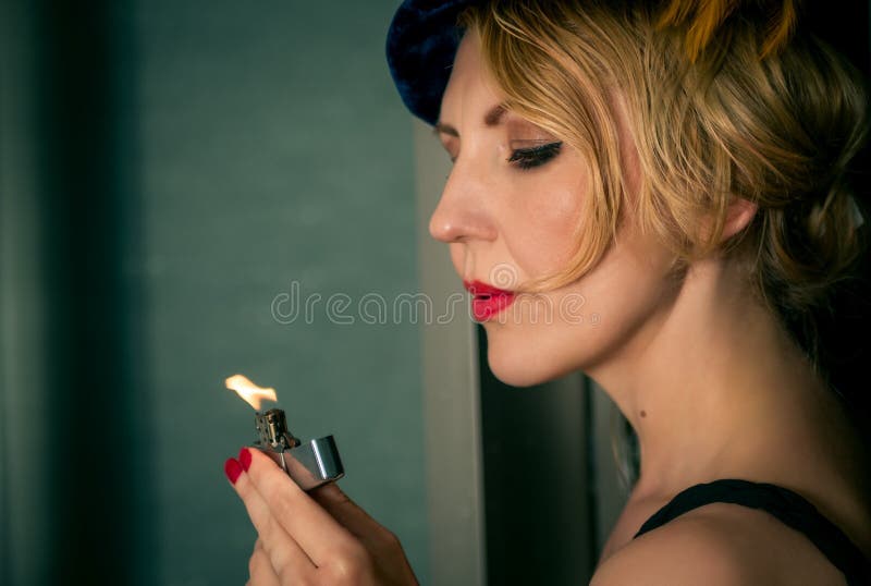 Vintage woman portrait with the lighter