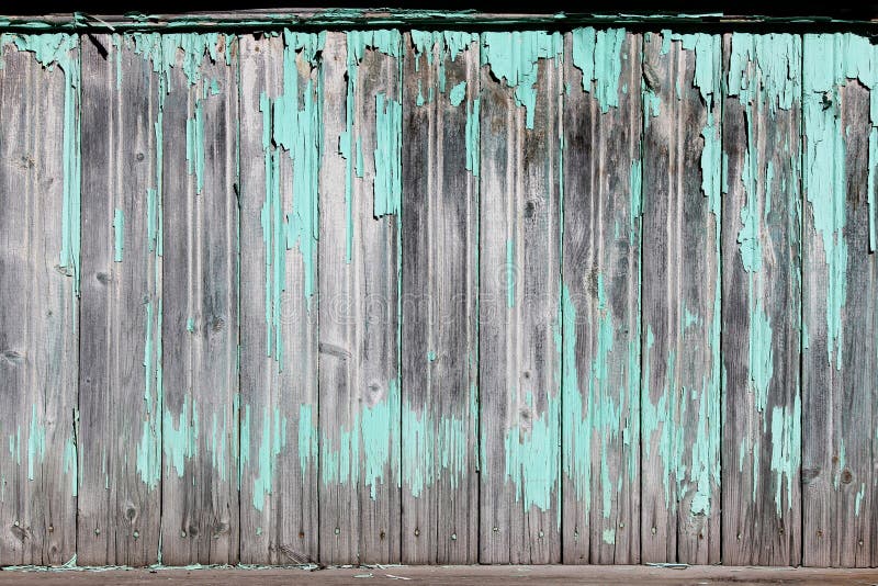 Vintage Wood Background with Peeling Turquoise Old Flaky Paint Stock