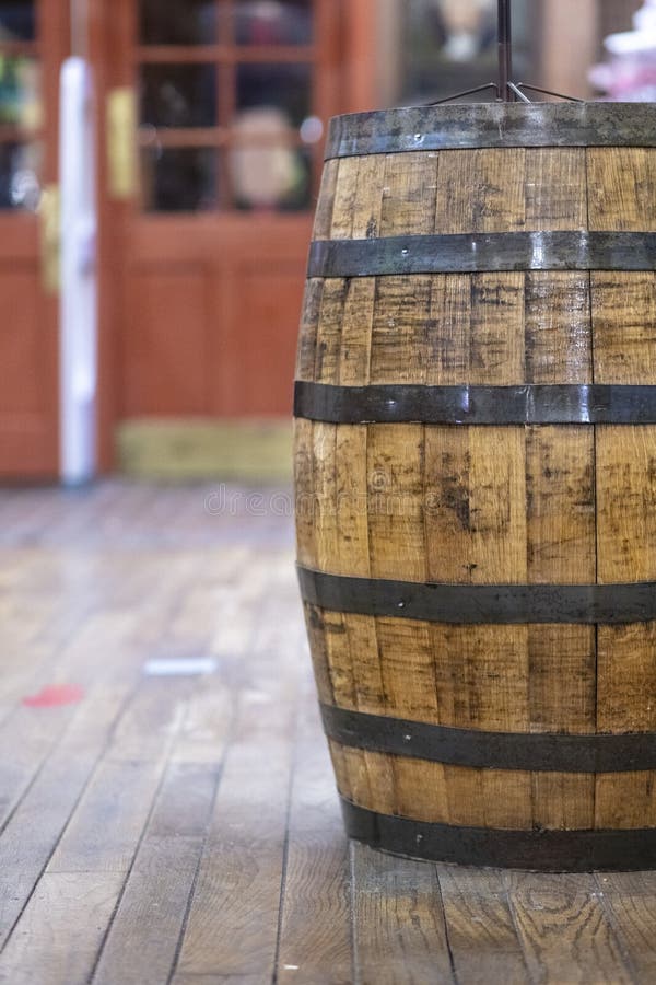 Vintage Wooden Rain Barrel in Old Fashioned Country Store