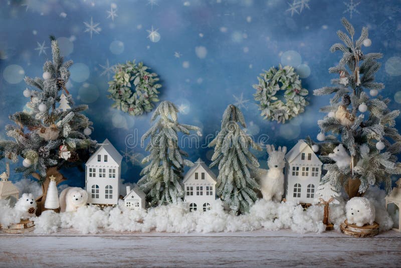 Vinterdiorama med hus och dekorationer