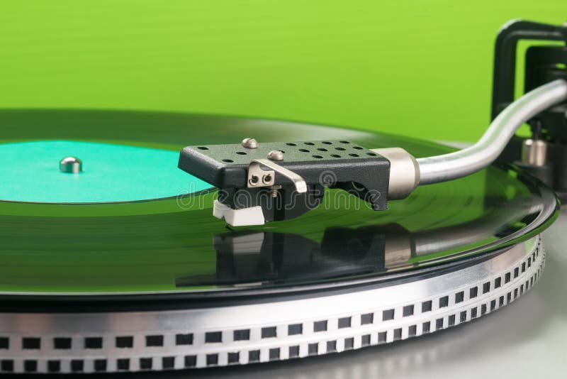 Vinyl Record Player on Green Background, Closeup Stock Photo Image