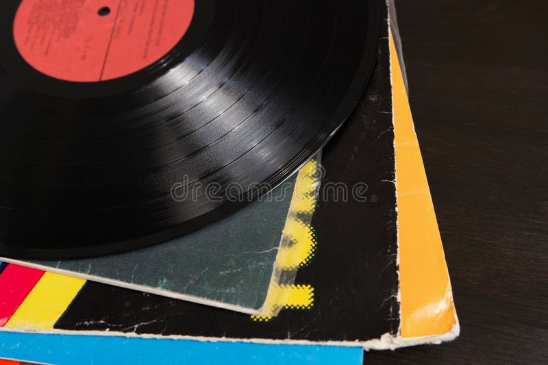 Vinyl Recording Disk and Different Albums Stock Image Image of