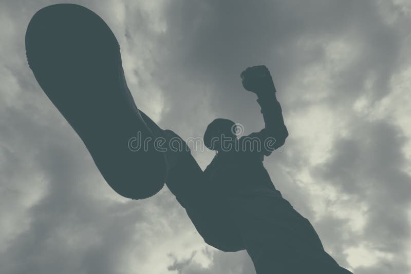 Violent attack, unrecognizable male criminal kicking and punchin stock image Violent attack, unrecognizable male criminal kicking and punchin stock image