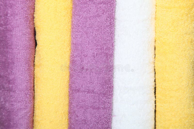 Violet, White and Yellow Towels Stock Image Image of setting, rolled