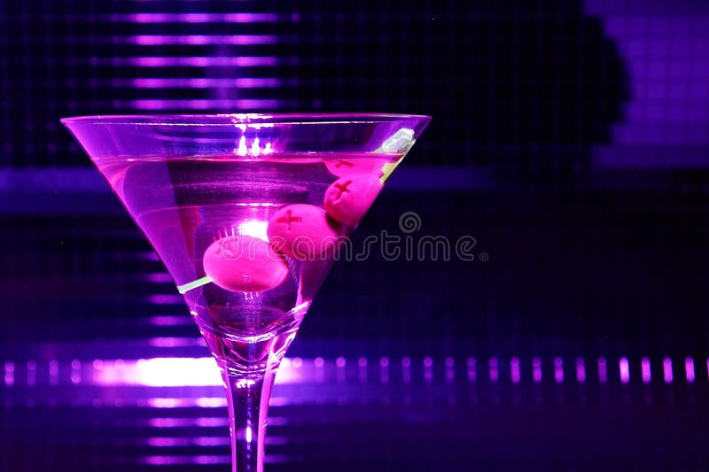 Violet olive in martini glass. Violet olive in martini glass