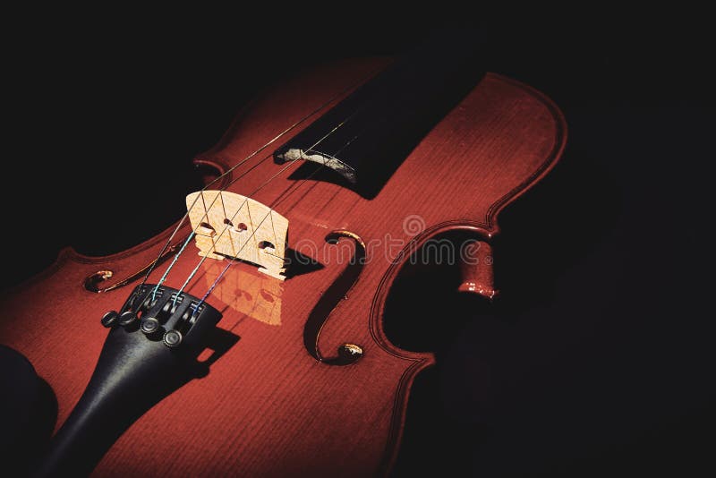 Violin on black background stock image. Image of fiddlestick 130343767