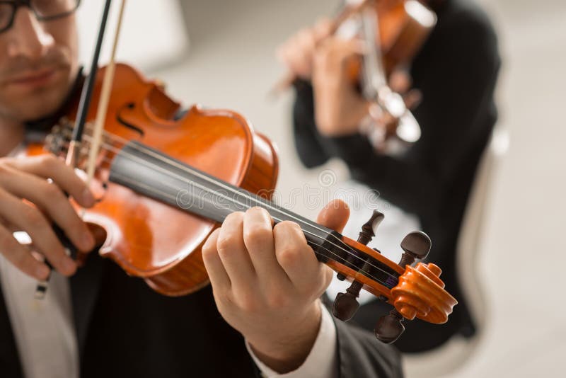 Violin duet performance stock image. Image of fiddle - 78051231