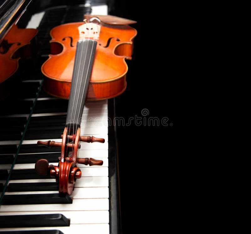 Violin on the piano royalty free stock photo