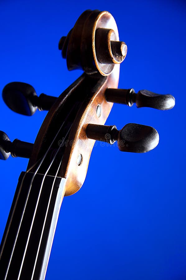 Violin Scroll Blue Bk royalty free stock photo