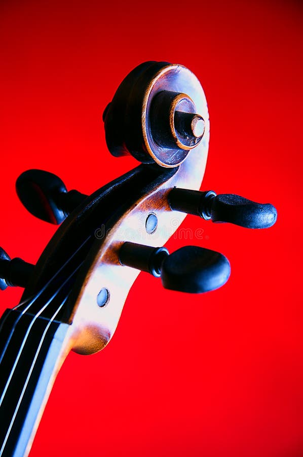 Violin Scroll Isolated on Red stock image