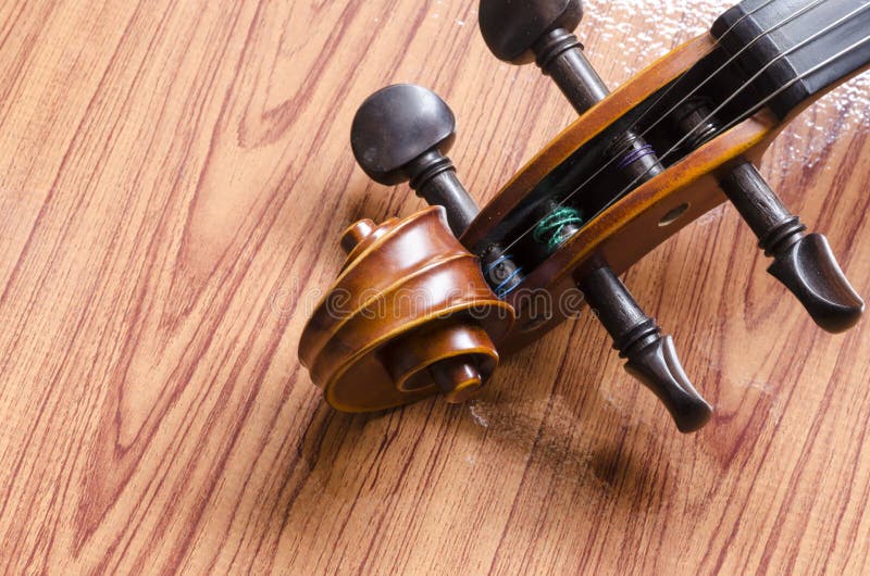 Violin on wood background