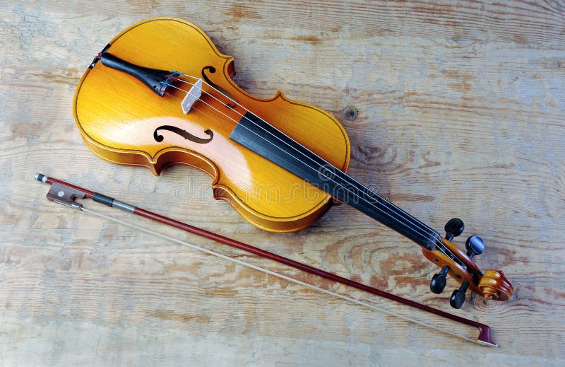 Violin on a Wooden Background. Stock Image - Image of harmony, wooden: 103559151 Violin on a Wooden Background. Stock Image - Image of harmony, wooden: 103559151