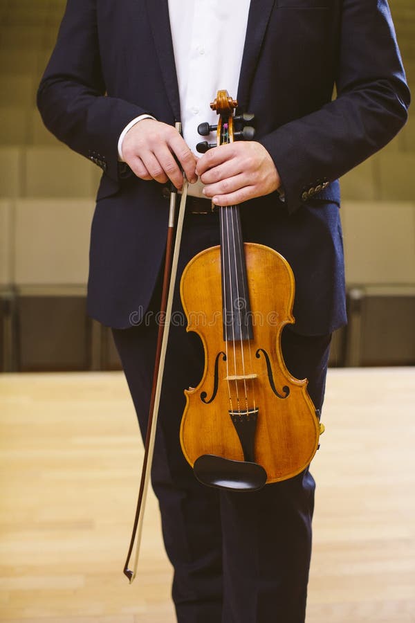 Violinist. Image of a Man Violinist in a Concert Hall. the Young Stock