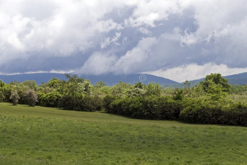Virginia Field, Mountains, Clouds royalty free stock photo Virginia Field, Mountains, Clouds royalty free stock photo