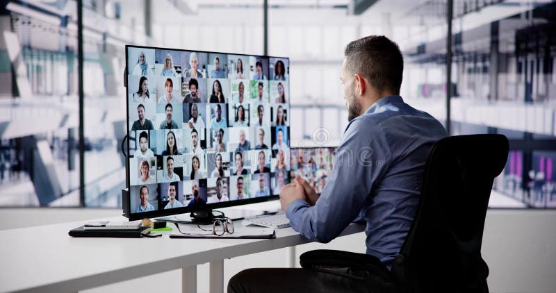 Virtual Hybrid Meeting In Office stock photography