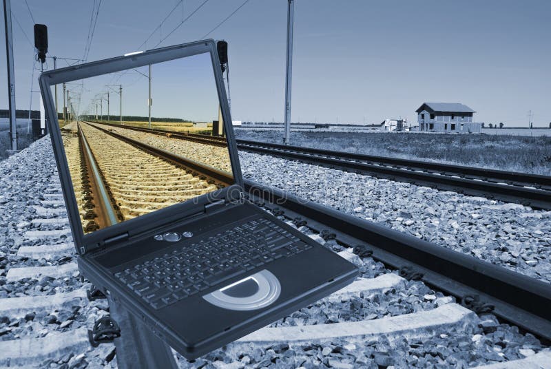 Una foto muestra computadora portátil sobre el vias ferreas en alto pantalla de computadora portátil Mostrar continuidad de barandilla en través de computadora portátil, énfasis es un metido sobre el vias ferreas , de virtualmente El camino sobre el desconocido.