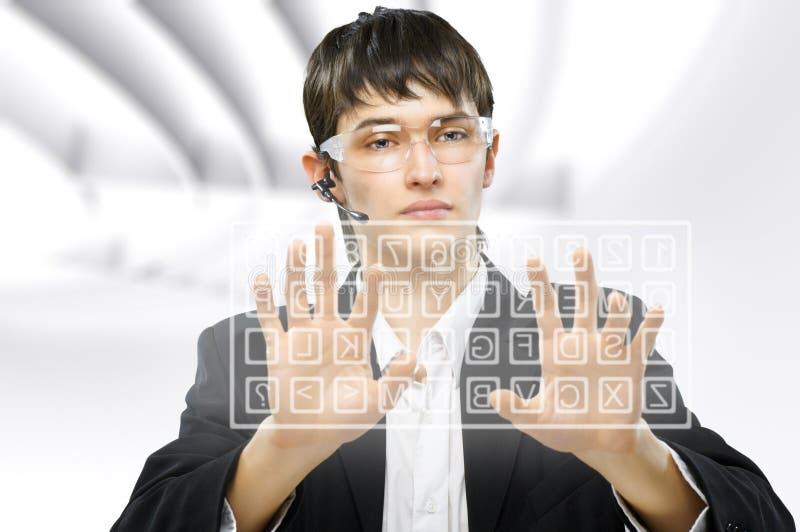 Successful business men use the virtual keyboard. Successful business men use the virtual keyboard