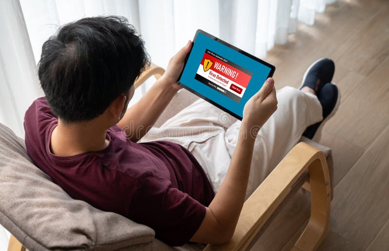 Virus warning alert on computer screen detected modish cyber threat stock photos
