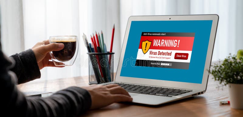 Virus warning alert on computer screen detected modish cyber threat stock photo