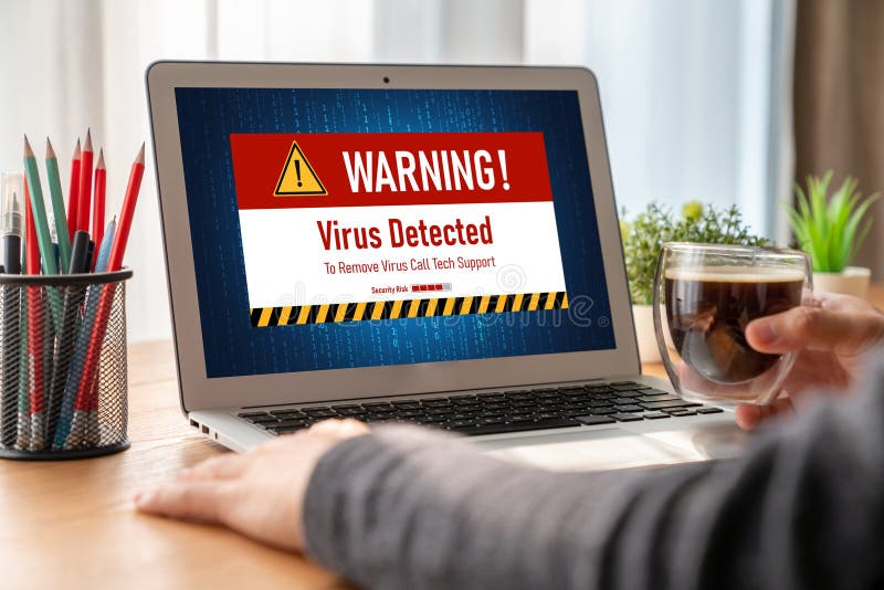 Virus warning alert on computer screen detected modish cyber threat stock photos