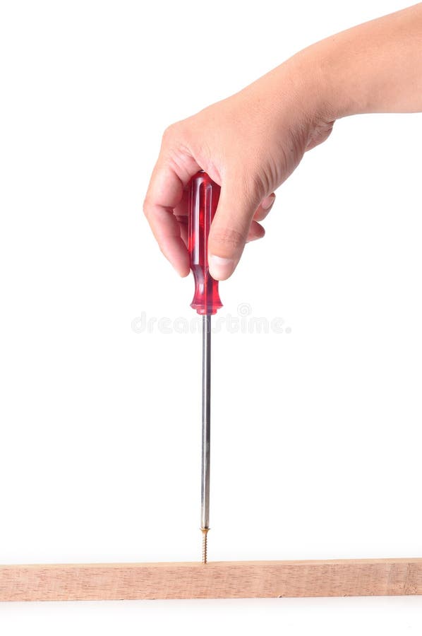 Vis dedans avec le tournevis image stock Vis dedans avec le tournevis image stock