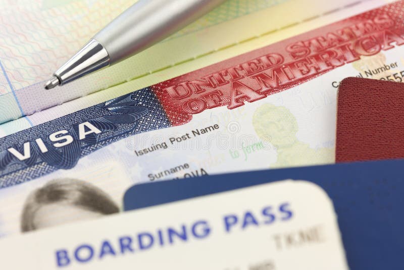 Visa des Etats-Unis, passeports, carte d'embarquement et stylo - voyage étranger